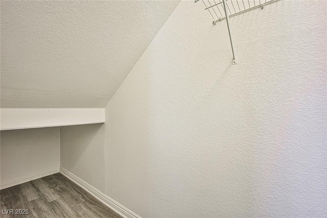 9271 Martel Ave, Las Vegas, NV 89148 - spacious closet featuring dark wood-style flooring and lofted ceiling