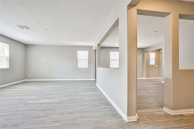9271 Martel Ave, Las Vegas, NV 89148 - unfurnished room with light wood-style floors and baseboards