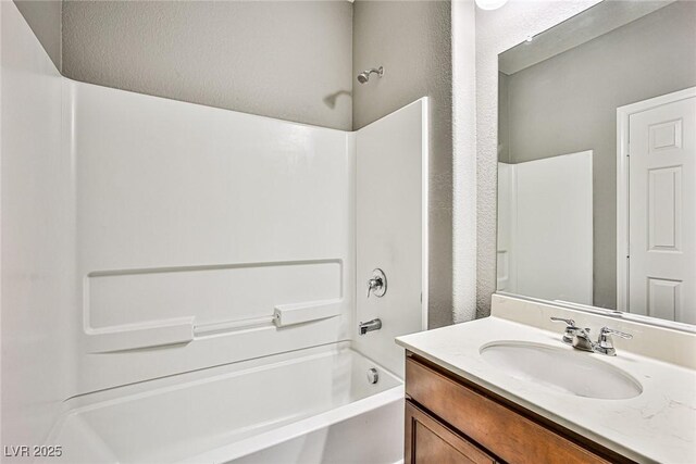 9271 Martel Ave, Las Vegas, NV 89148 - bathroom featuring tub / shower combination and vanity