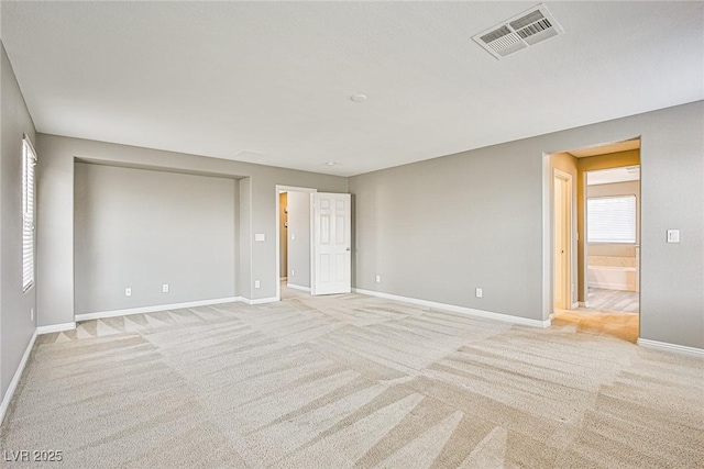 9271 Martel Ave, Las Vegas, NV 89148 - spare room featuring light carpet and baseboards