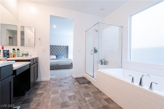 4376 Latitude Valley Ct, North Las Vegas, NV 89084 - bathroom with vanity, a stall shower, a garden tub, and connected bathroom