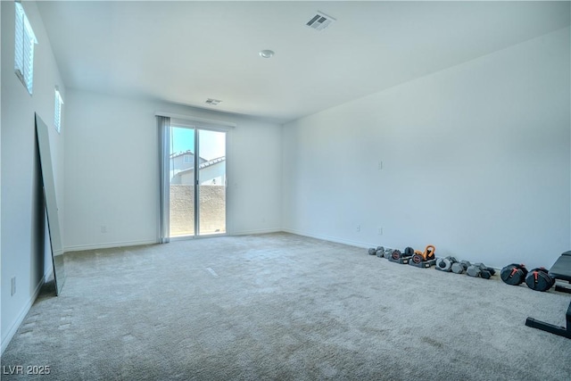 4376 Latitude Valley Ct, North Las Vegas, NV 89084 - spare room with light carpet and baseboards