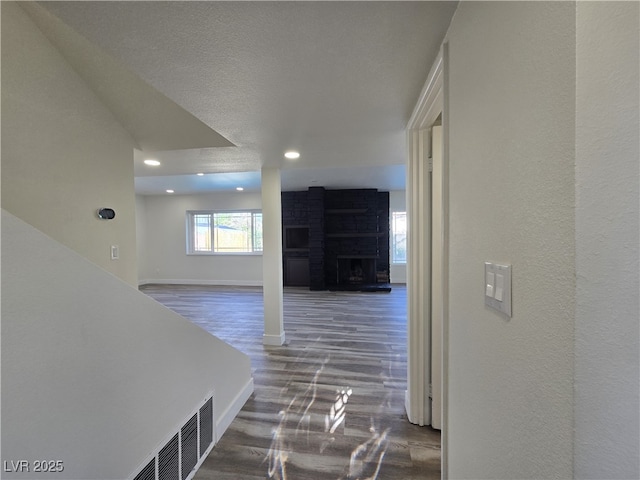 3056 Garnet Ct, Las Vegas, NV 89121 - hall featuring wood finished floors, baseboards, and recessed lighting