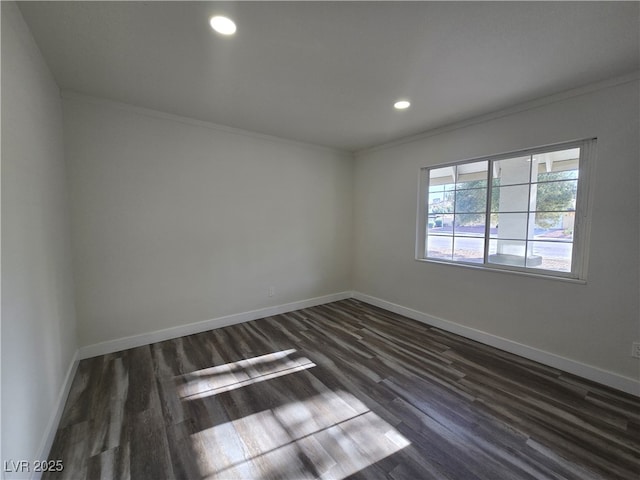 3056 Garnet Ct, Las Vegas, NV 89121 - unfurnished room with crown molding, baseboards, dark wood finished floors, and recessed lighting