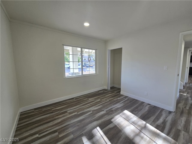 3056 Garnet Ct, Las Vegas, NV 89121 - spare room featuring dark wood-style flooring, baseboards, recessed lighting, and crown molding