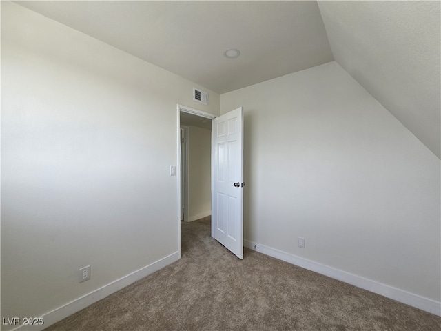 3056 Garnet Ct, Las Vegas, NV 89121 - empty room with carpet flooring, baseboards, and vaulted ceiling