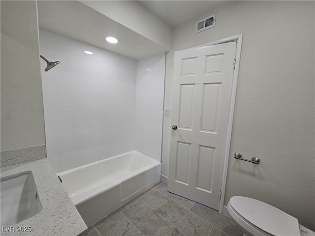 3056 Garnet Ct, Las Vegas, NV 89121 - bathroom with toilet, tub / shower combination, vanity, and recessed lighting