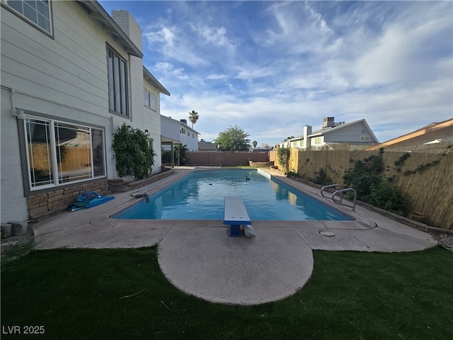 3056 Garnet Ct, Las Vegas, NV 89121 - view of swimming pool featuring a diving board and a patio