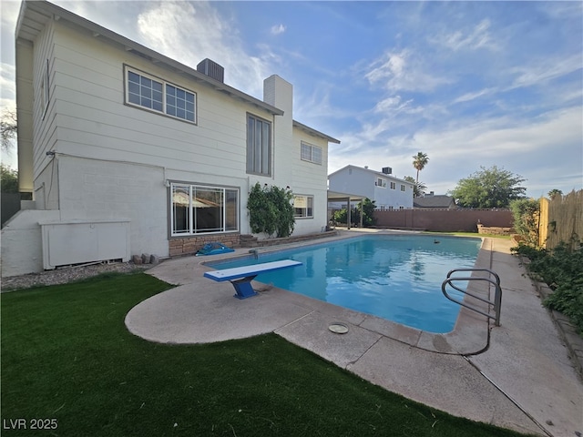 3056 Garnet Ct, Las Vegas, NV 89121 - view of swimming pool with a patio and a diving board