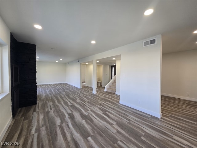 3056 Garnet Ct, Las Vegas, NV 89121 - finished basement with wood finished floors, stairs, recessed lighting, and baseboards