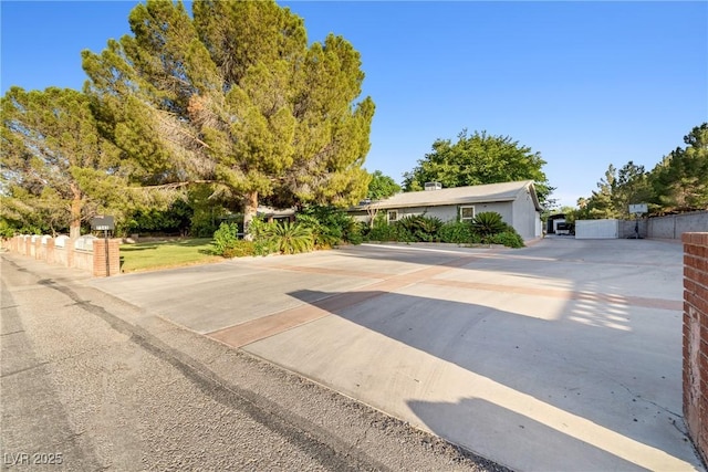 7545 Constantinople Ave, Las Vegas, NV 89129 - view of front of property with concrete driveway