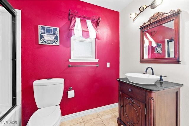 7545 Constantinople Ave, Las Vegas, NV 89129 - bathroom featuring vanity, toilet, tile patterned flooring, and baseboards