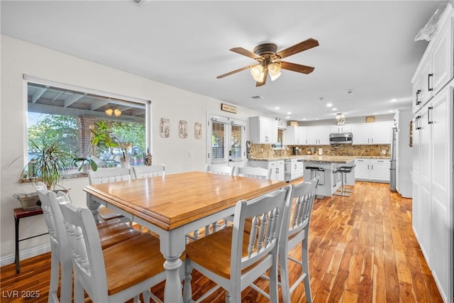 7545 Constantinople Ave, Las Vegas, NV 89129 - dining area featuring ceiling fan, light wood finished floors, recessed lighting, and baseboards