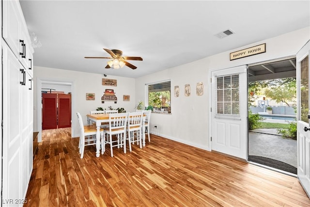 7545 Constantinople Ave, Las Vegas, NV 89129 - dining room featuring light wood finished floors, ceiling fan, and baseboards