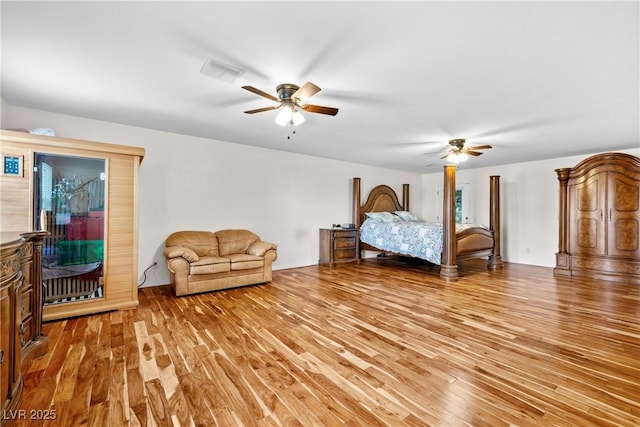 7545 Constantinople Ave, Las Vegas, NV 89129 - bedroom featuring light wood-style floors and ceiling fan