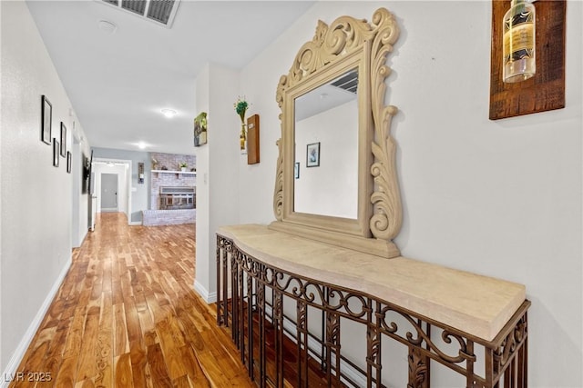 7545 Constantinople Ave, Las Vegas, NV 89129 - hallway featuring light wood-style flooring and baseboards