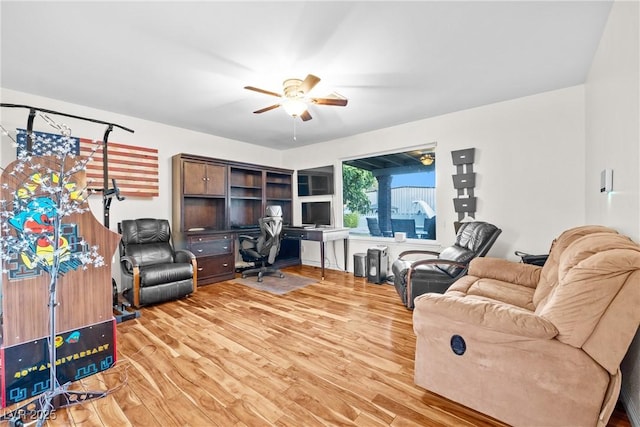 7545 Constantinople Ave, Las Vegas, NV 89129 - living area featuring ceiling fan, an office area, and wood finished floors