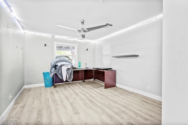 7545 Constantinople Ave, Las Vegas, NV 89129 - home office featuring wood finished floors, ceiling fan, and baseboards