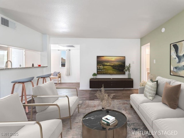 753 Oakmont Ave Unit 802, Las Vegas, NV 89109 - living area with wood finished floors