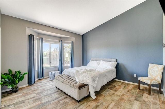 3112 Haddon Dr, Las Vegas, NV 89134 - bedroom with light wood-type flooring and baseboards
