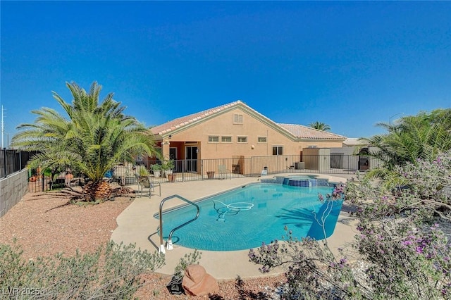 3112 Haddon Dr, Las Vegas, NV 89134 - view of pool featuring a pool with connected hot tub and a patio area