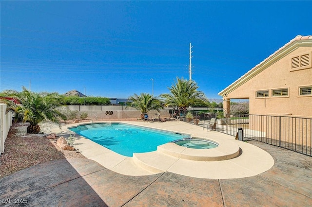 3112 Haddon Dr, Las Vegas, NV 89134 - view of swimming pool with a pool with connected hot tub, a fenced backyard, and a patio area
