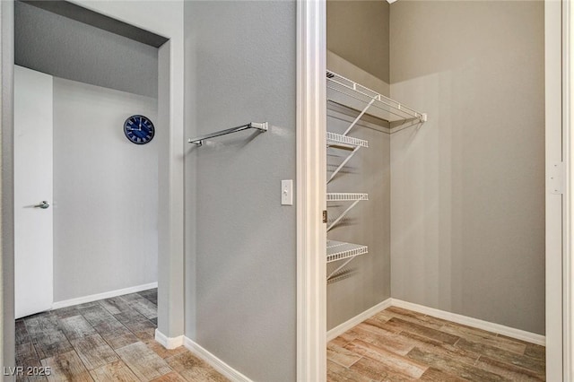 3112 Haddon Dr, Las Vegas, NV 89134 - walk in closet with wood finished floors