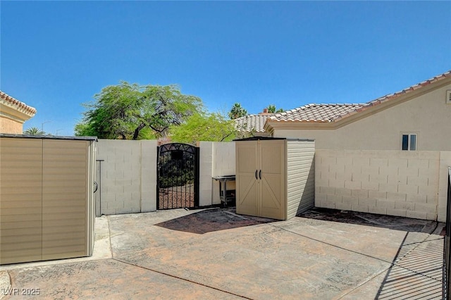 3112 Haddon Dr, Las Vegas, NV 89134 - view of patio / terrace featuring a gate and a shed