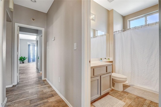 3112 Haddon Dr, Las Vegas, NV 89134 - hallway featuring light wood-style floors and plenty of natural light