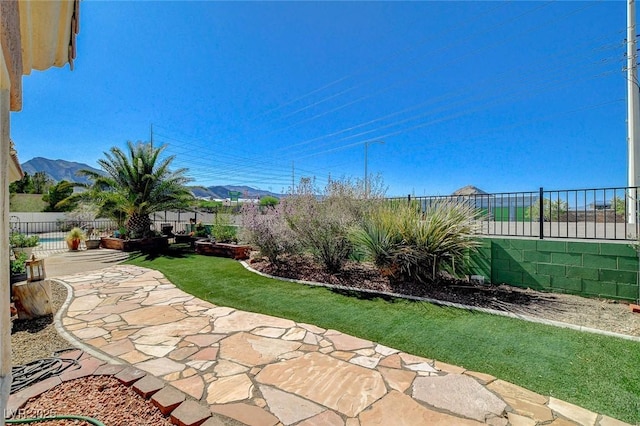 3112 Haddon Dr, Las Vegas, NV 89134 - fenced backyard featuring a patio area and a mountain view