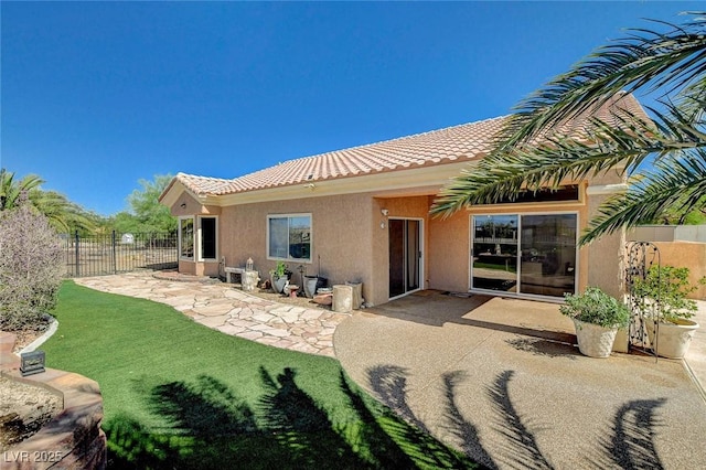 3112 Haddon Dr, Las Vegas, NV 89134 - rear view of property with a tile roof, stucco siding, and a patio