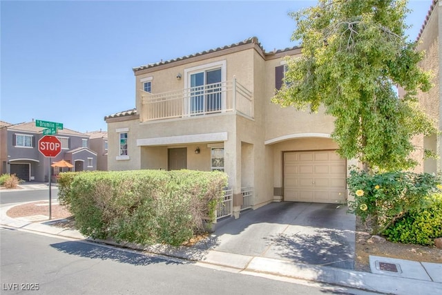 6217 Lapilli Ave, Las Vegas, NV 89139 - view of property featuring stucco siding, driveway, a garage, and a tiled roof