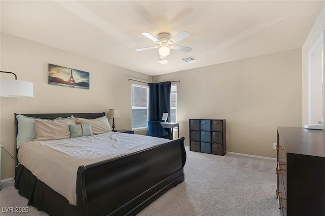 6217 Lapilli Ave, Las Vegas, NV 89139 - bedroom featuring light colored carpet, baseboards, and ceiling fan