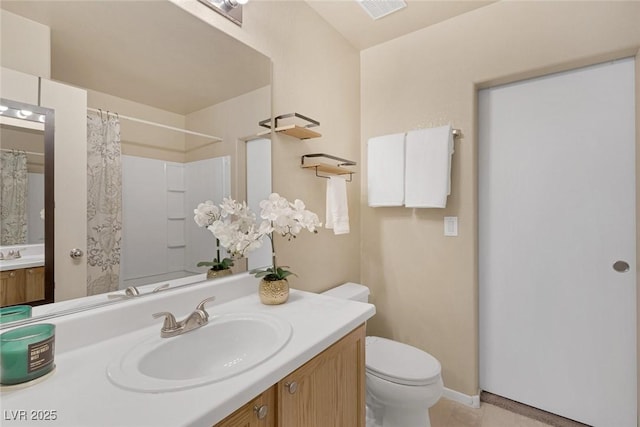 6217 Lapilli Ave, Las Vegas, NV 89139 - bathroom featuring toilet, vanity, tile patterned floors, a shower with curtain, and baseboards