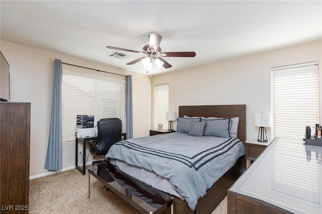 9039 Alex Creek Ave, Las Vegas, NV 89149 - bedroom featuring light carpet, a ceiling fan, an office area, and baseboards