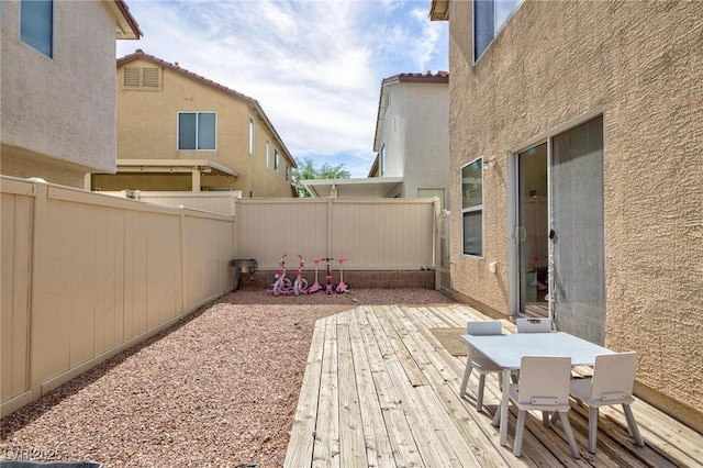 9039 Alex Creek Ave, Las Vegas, NV 89149 - fenced backyard featuring outdoor dining space and a deck