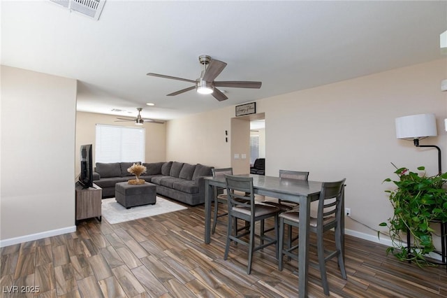 9039 Alex Creek Ave, Las Vegas, NV 89149 - dining room featuring ceiling fan, dark wood-style floors, and baseboards
