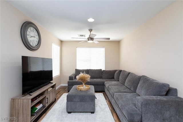 9039 Alex Creek Ave, Las Vegas, NV 89149 - living room featuring a ceiling fan, light wood-style floors, and baseboards