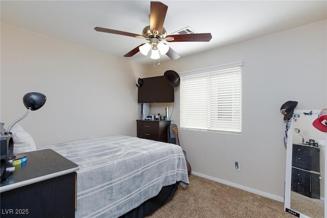 9039 Alex Creek Ave, Las Vegas, NV 89149 - carpeted bedroom with a ceiling fan and baseboards