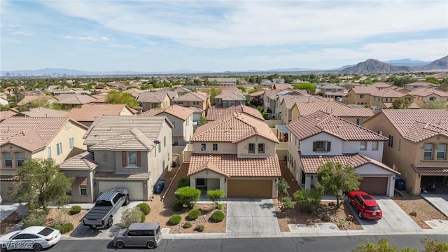 9039 Alex Creek Ave, Las Vegas, NV 89149 - aerial perspective of suburban area featuring a mountainous background