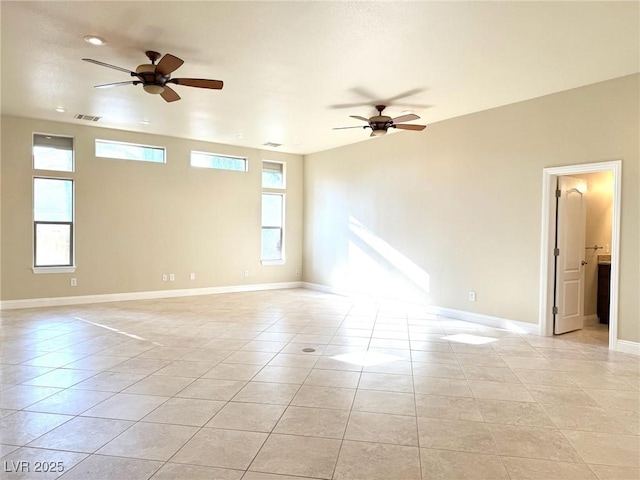 5451 Fernwood Ct, Pahrump, NV 89061 - unfurnished room featuring a ceiling fan, light tile patterned floors, baseboards, and recessed lighting