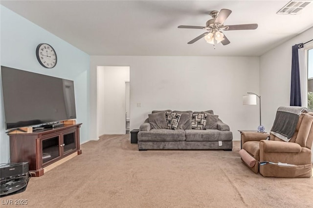 3821 E Summit Ave, Pahrump, NV 89061 - living area with carpet and a ceiling fan
