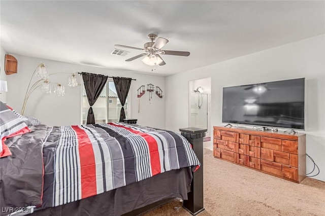 3821 E Summit Ave, Pahrump, NV 89061 - carpeted bedroom featuring connected bathroom and ceiling fan