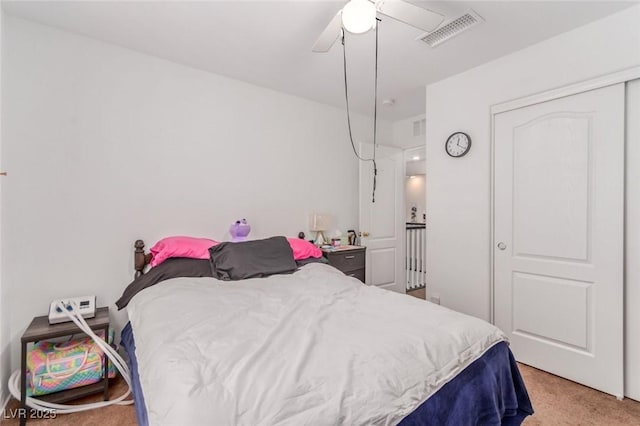3821 E Summit Ave, Pahrump, NV 89061 - bedroom with light colored carpet and a ceiling fan
