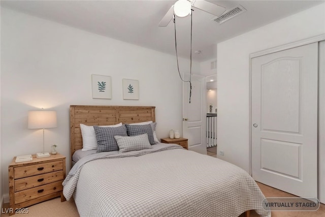 3821 E Summit Ave, Pahrump, NV 89061 - bedroom featuring light carpet and ceiling fan