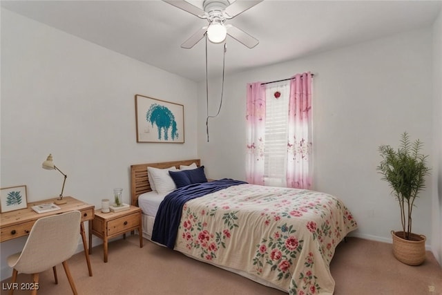 3821 E Summit Ave, Pahrump, NV 89061 - bedroom with light carpet, ceiling fan, and baseboards