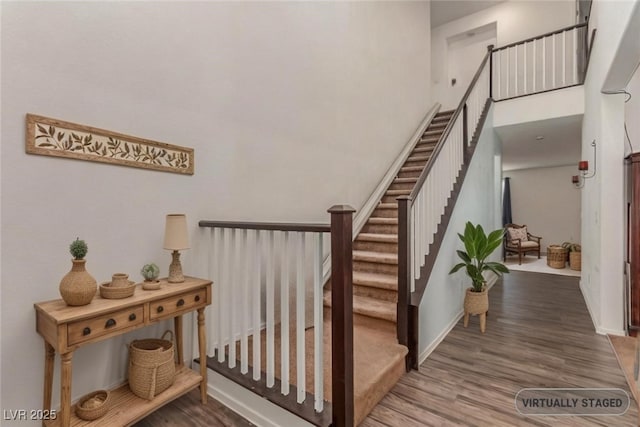 3821 E Summit Ave, Pahrump, NV 89061 - staircase with wood finished floors and baseboards