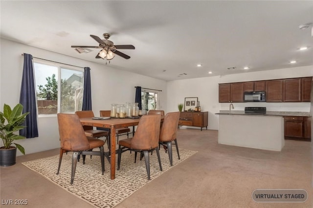3821 E Summit Ave, Pahrump, NV 89061 - dining space featuring ceiling fan, recessed lighting, and light colored carpet