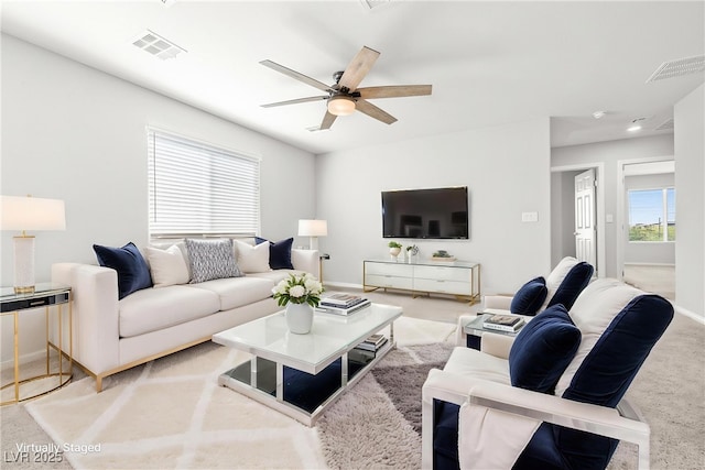 4519 Stardusk Falls Ave, North Las Vegas, NV 89084 - living room with carpet, a ceiling fan, and baseboards
