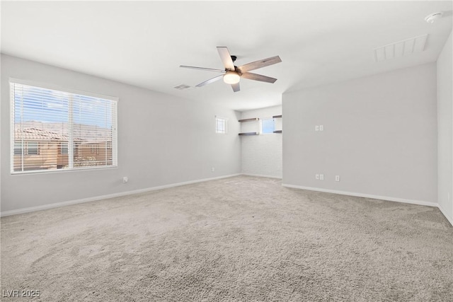 4519 Stardusk Falls Ave, North Las Vegas, NV 89084 - carpeted empty room featuring ceiling fan, baseboards, and a smoke detector